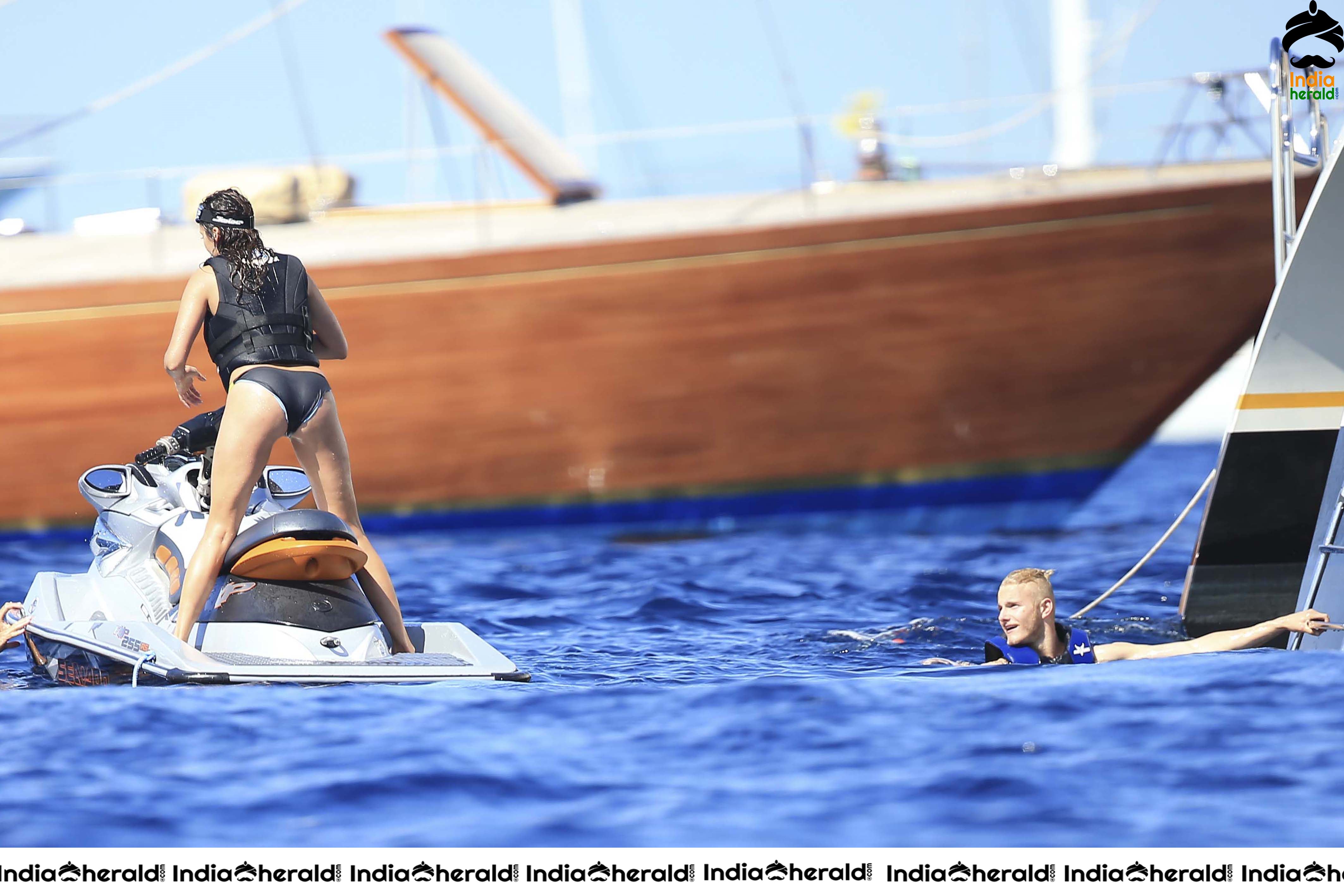 Nina Dobrev wearing a Hot Bikini on a yacht in Ibiza Set 2