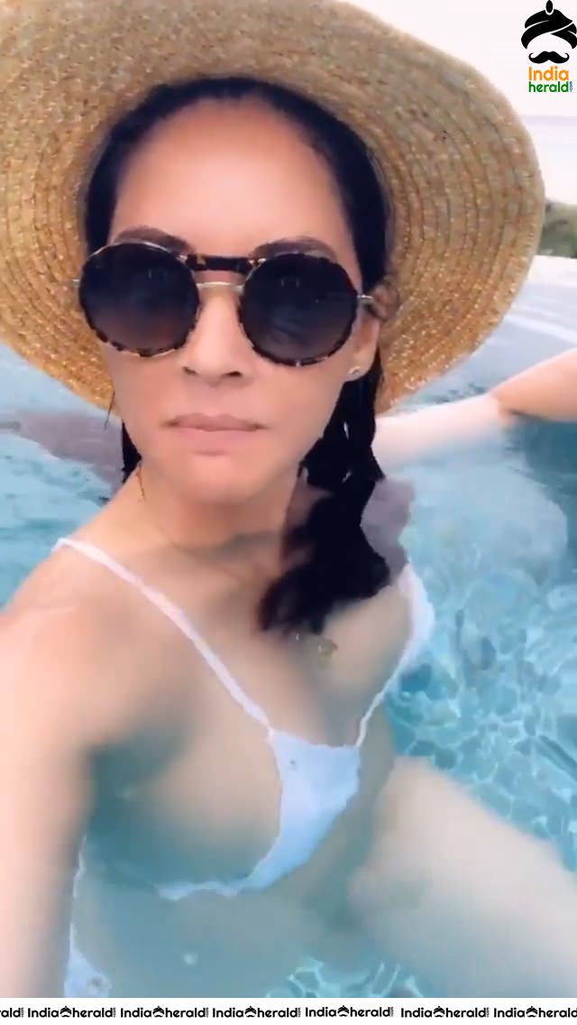 Olivia Munn in a White Lace Bikini