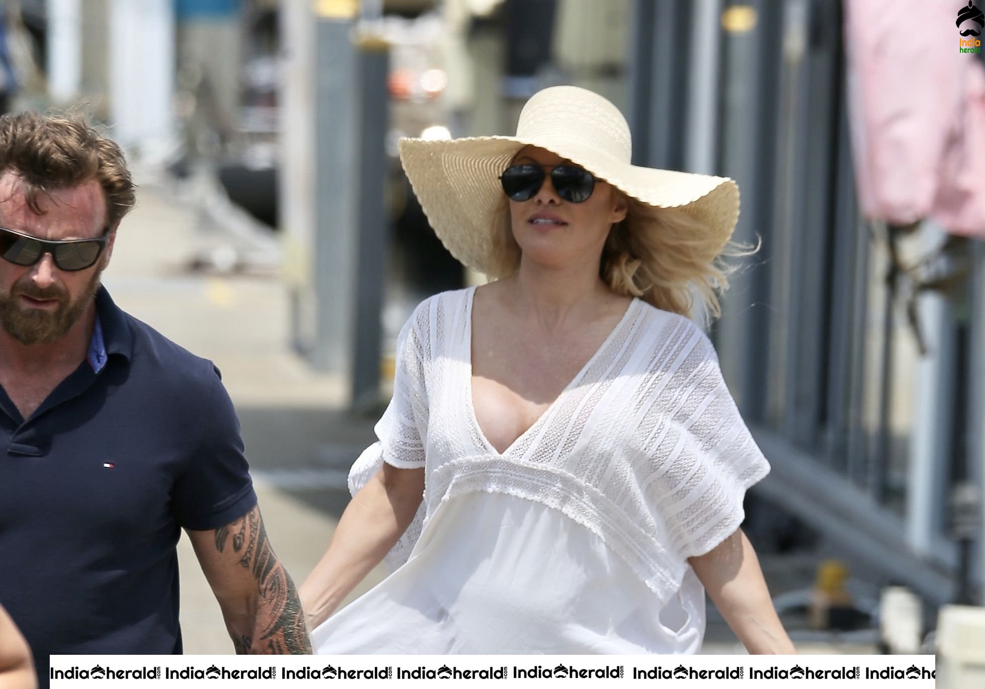 Pamela Anderson Poses in swimsuit for a photoshoot on the Gold Coast Australia