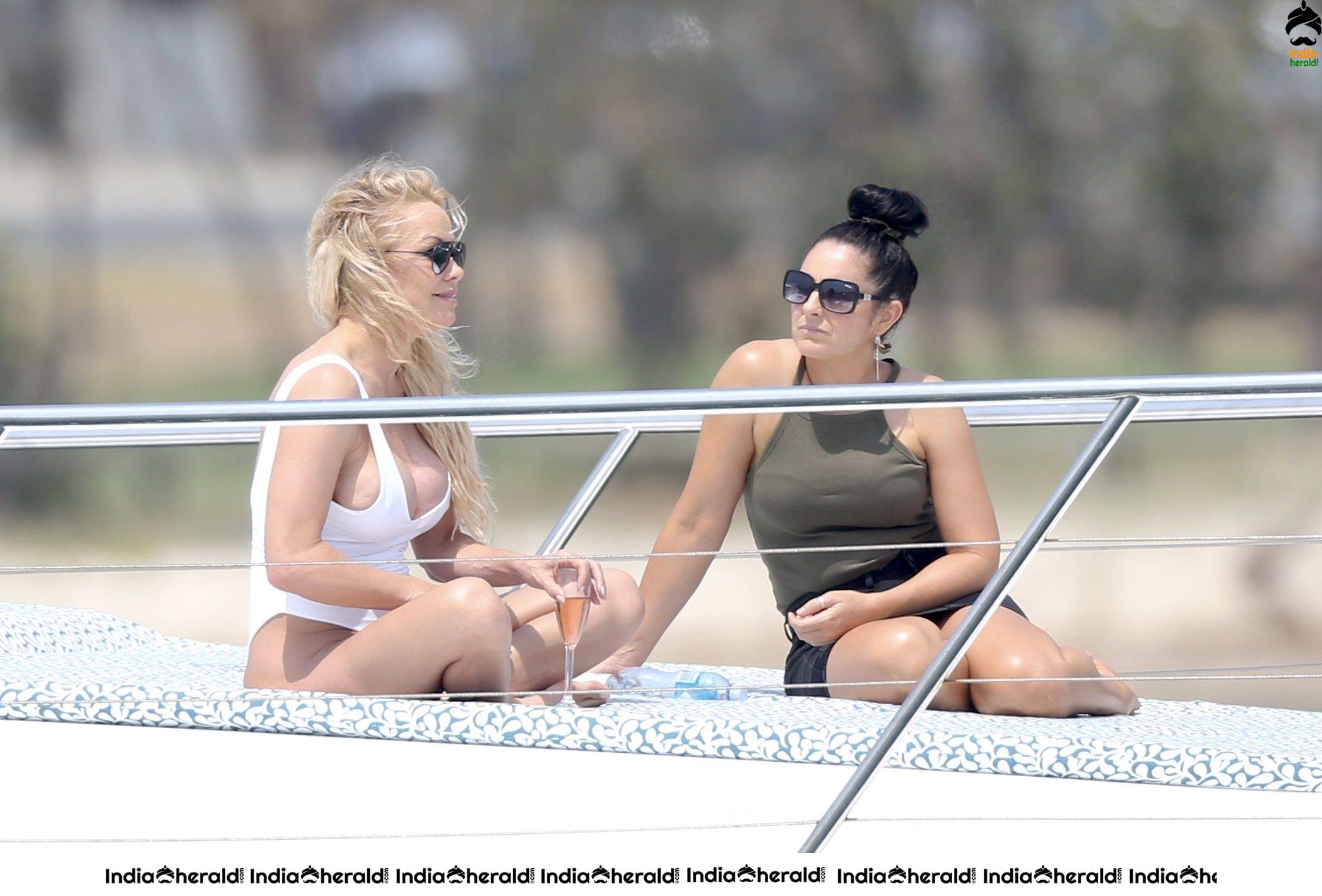 Pamela Anderson Poses in swimsuit for a photoshoot on the Gold Coast Australia