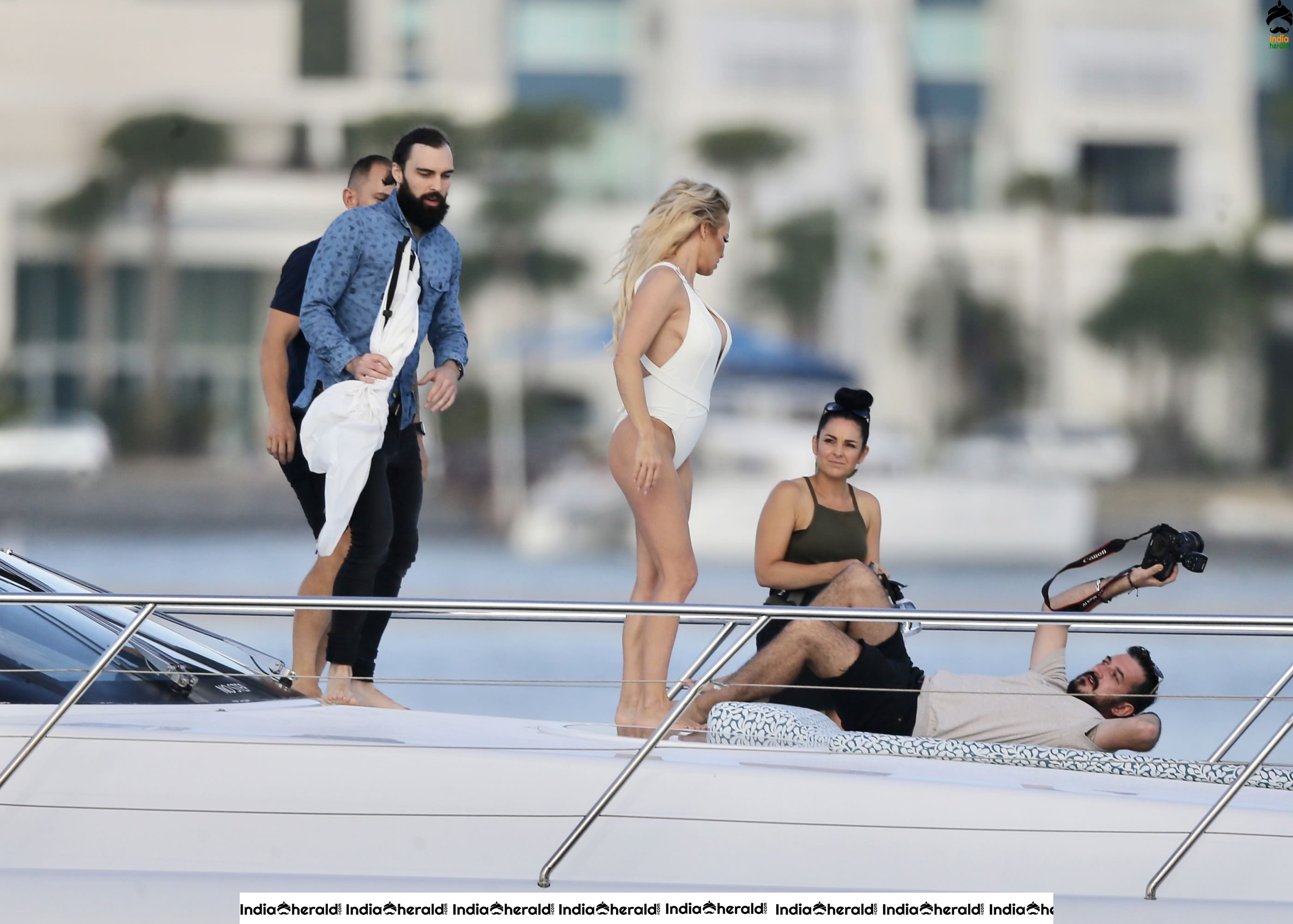 Pamela Anderson Poses in swimsuit for a photoshoot on the Gold Coast Australia