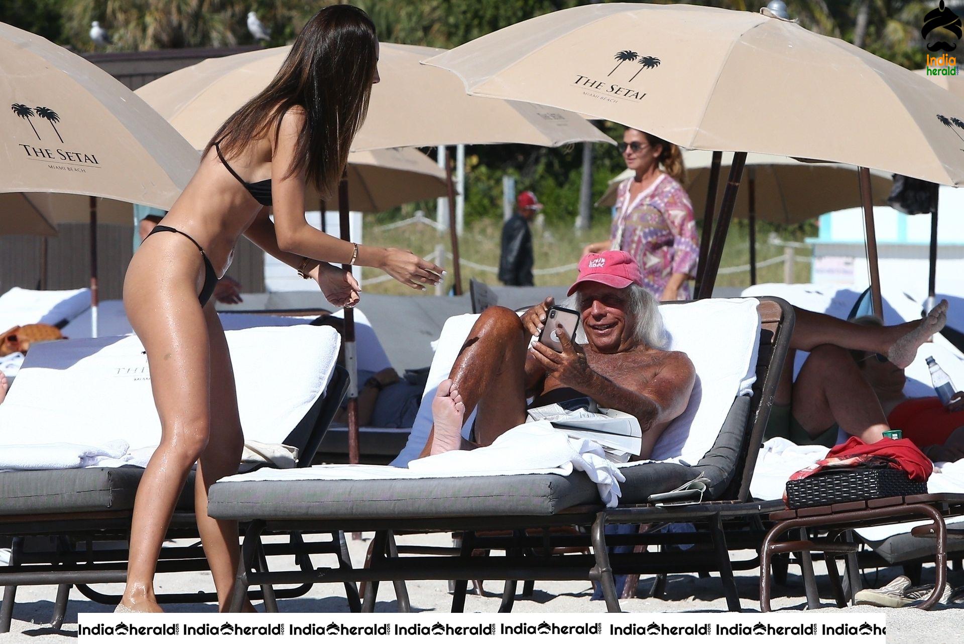Patricia Contreras takes a quick dip in the water while at the beach in Miami