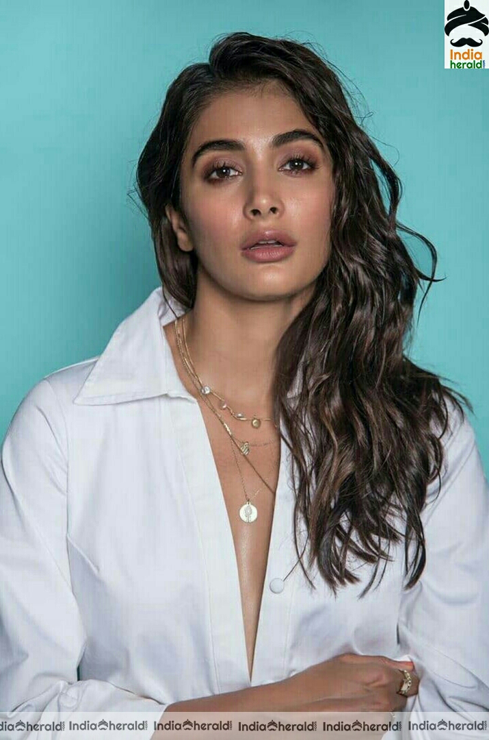 Pooja Hegde Hot Cleavage and Thighs Show In Short Dress Stills