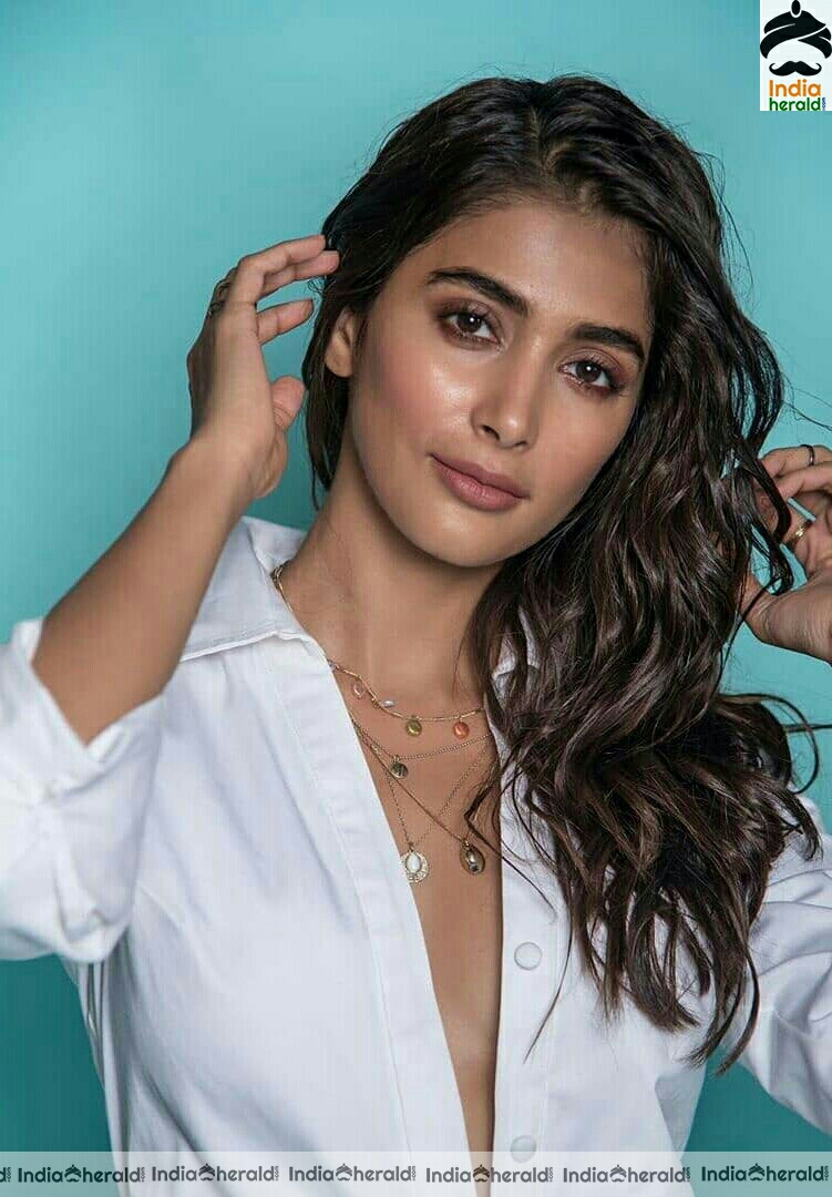 Pooja Hegde Hot Cleavage and Thighs Show In Short Dress Stills