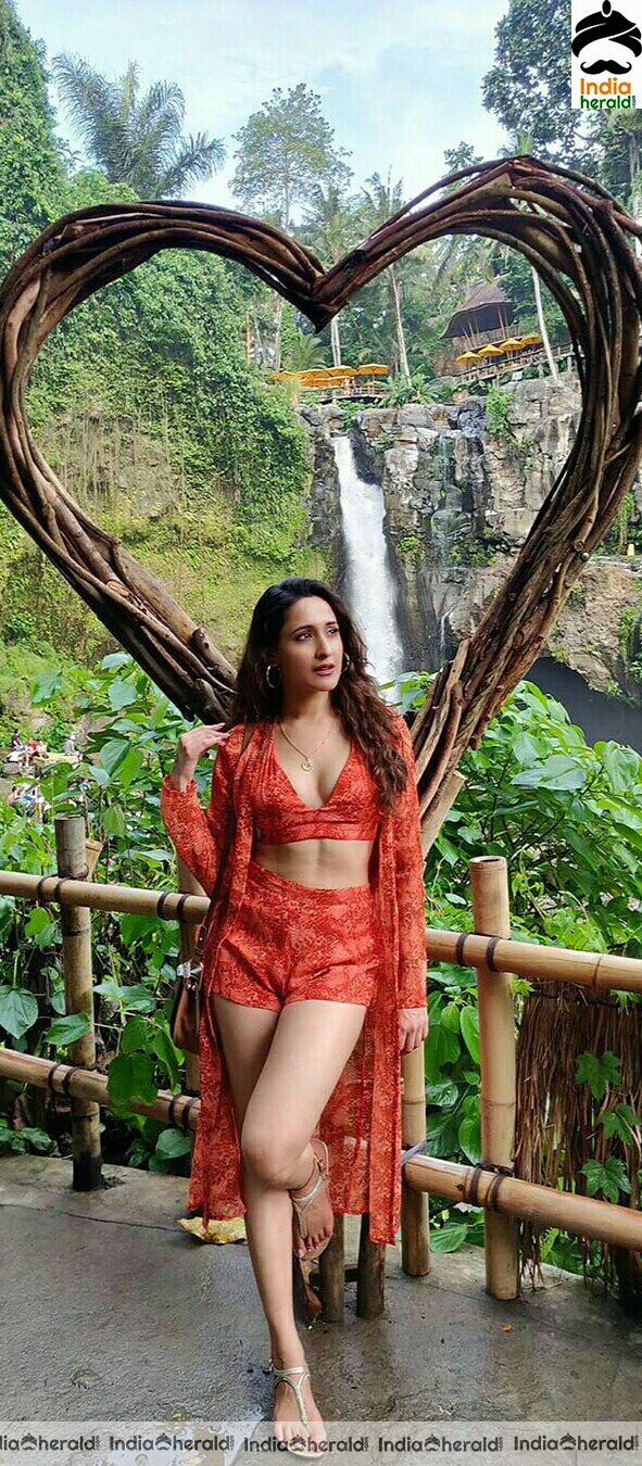 Pragya Jaiswal Wearing A Red Brassiere And Exposing During Her Vacation