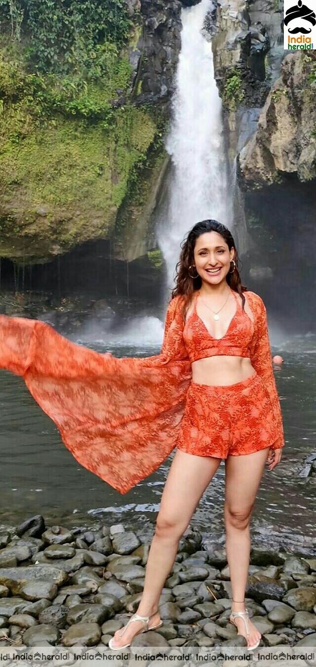 Pragya Jaiswal Wearing A Red Brassiere And Exposing During Her Vacation