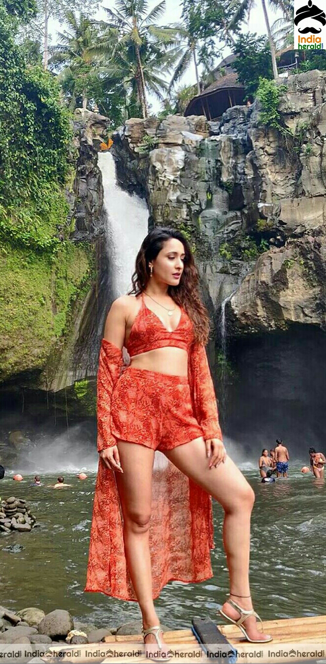 Pragya Jaiswal Wearing A Red Brassiere And Exposing During Her Vacation