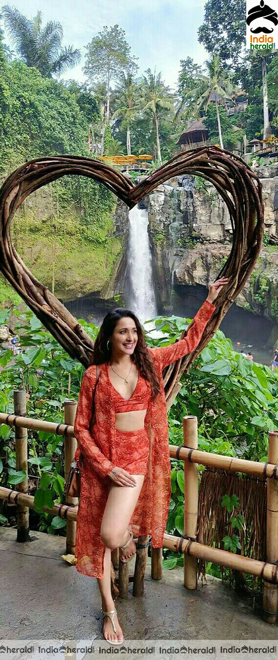 Pragya Jaiswal Wearing A Red Brassiere And Exposing During Her Vacation