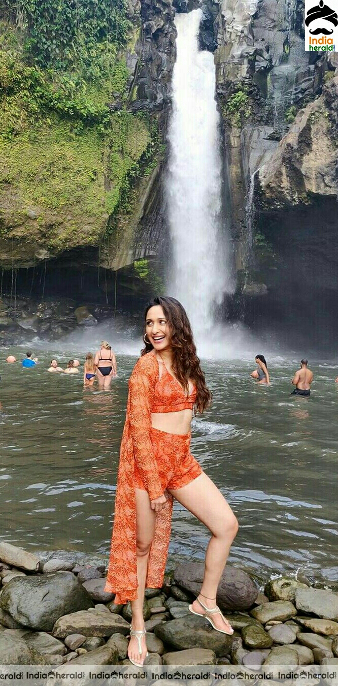 Pragya Jaiswal Wearing A Red Brassiere And Exposing During Her Vacation