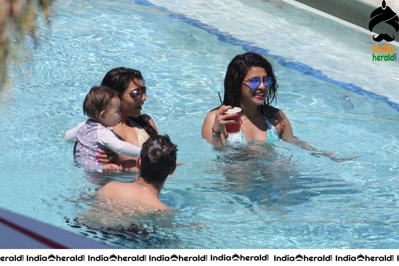 Priyanka Chopra Hot Photos in Bikini by pool side in Miami Set 2