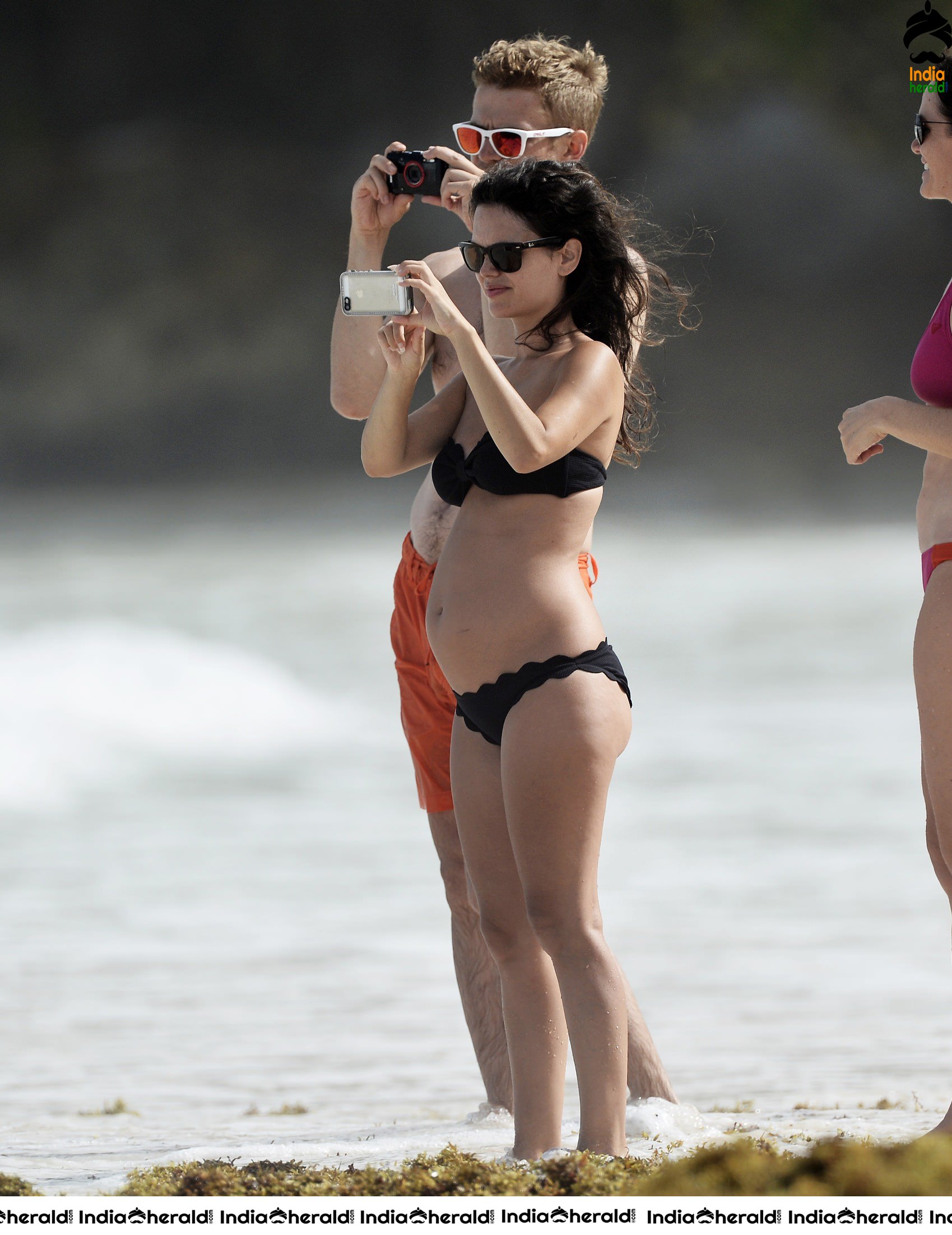 Rachel Bilson wearing a Black Bikini and flaunting her bump at a beach in Barbados Set 2