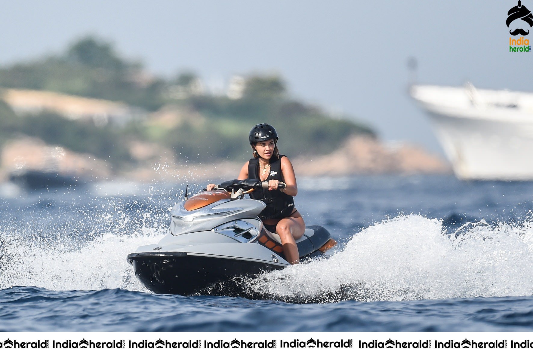 Rita Ora in a Bikini while having fun at Porto Cervo