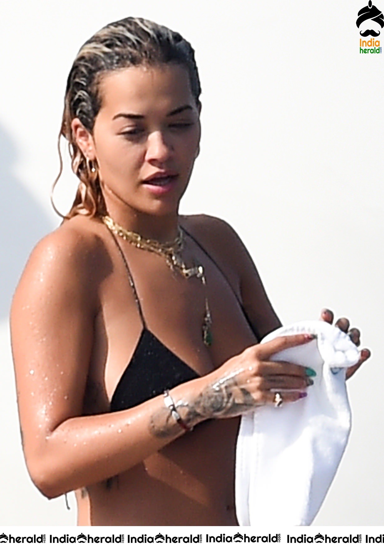 Rita Ora in a Bikini while having fun at Porto Cervo