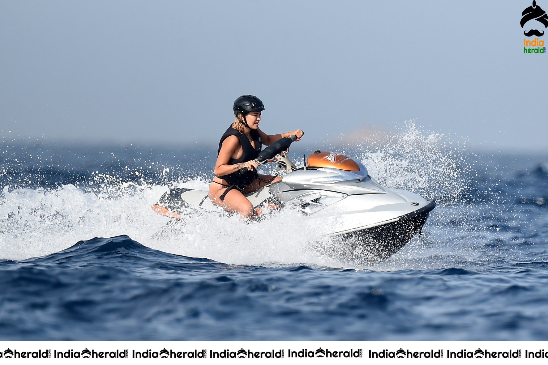 Rita Ora in a Bikini while having fun at Porto Cervo