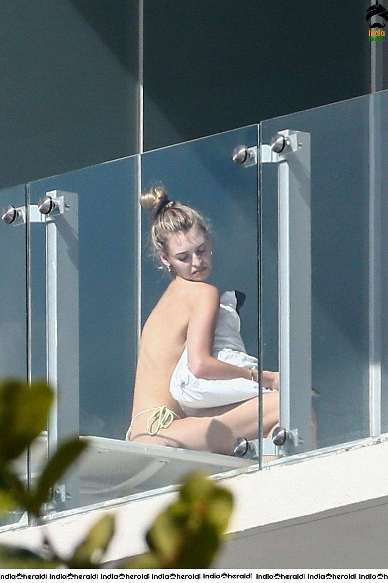 Roosmarijn de Kok sunbathing in Bikini off her balcony in Miami
