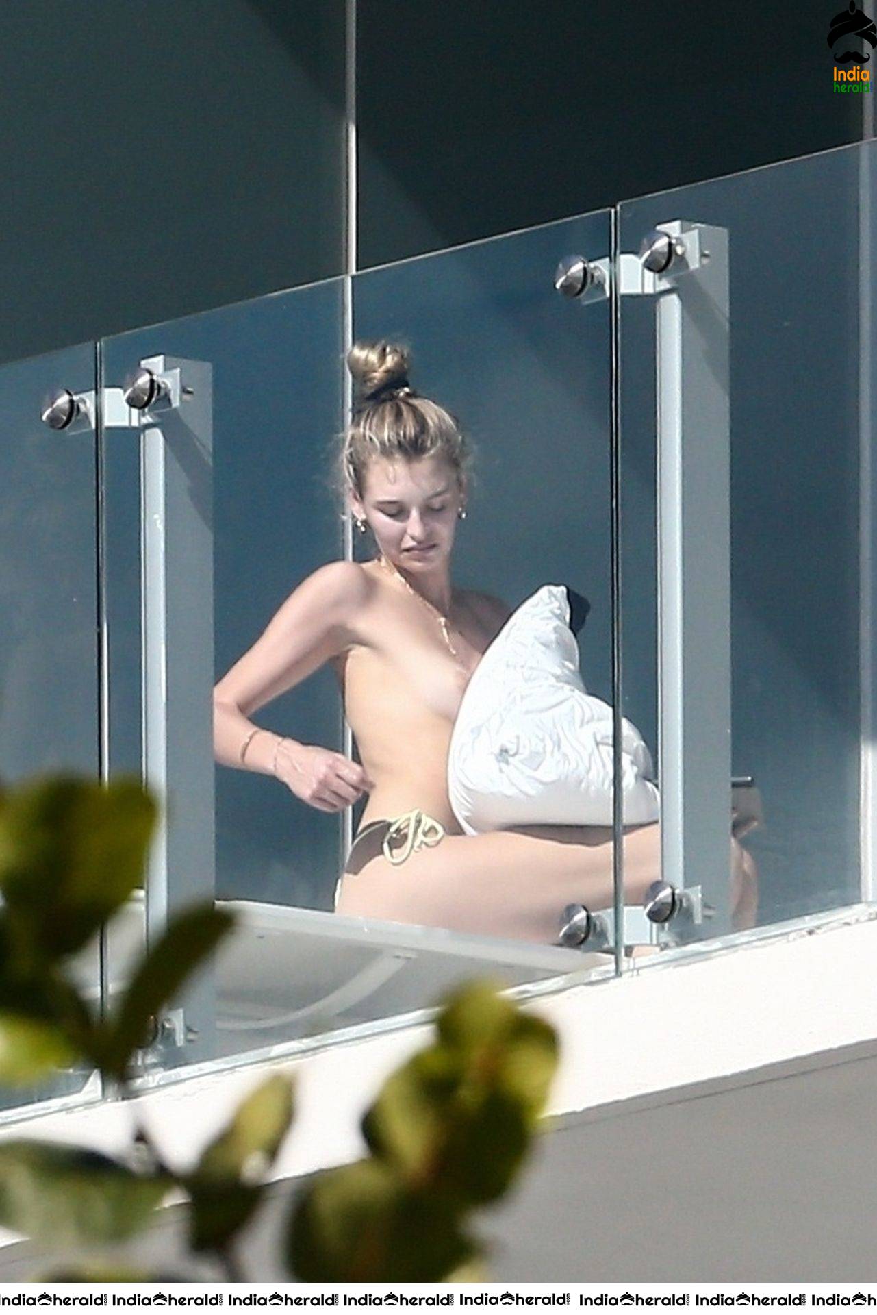 Roosmarijn de Kok sunbathing in Bikini off her balcony in Miami