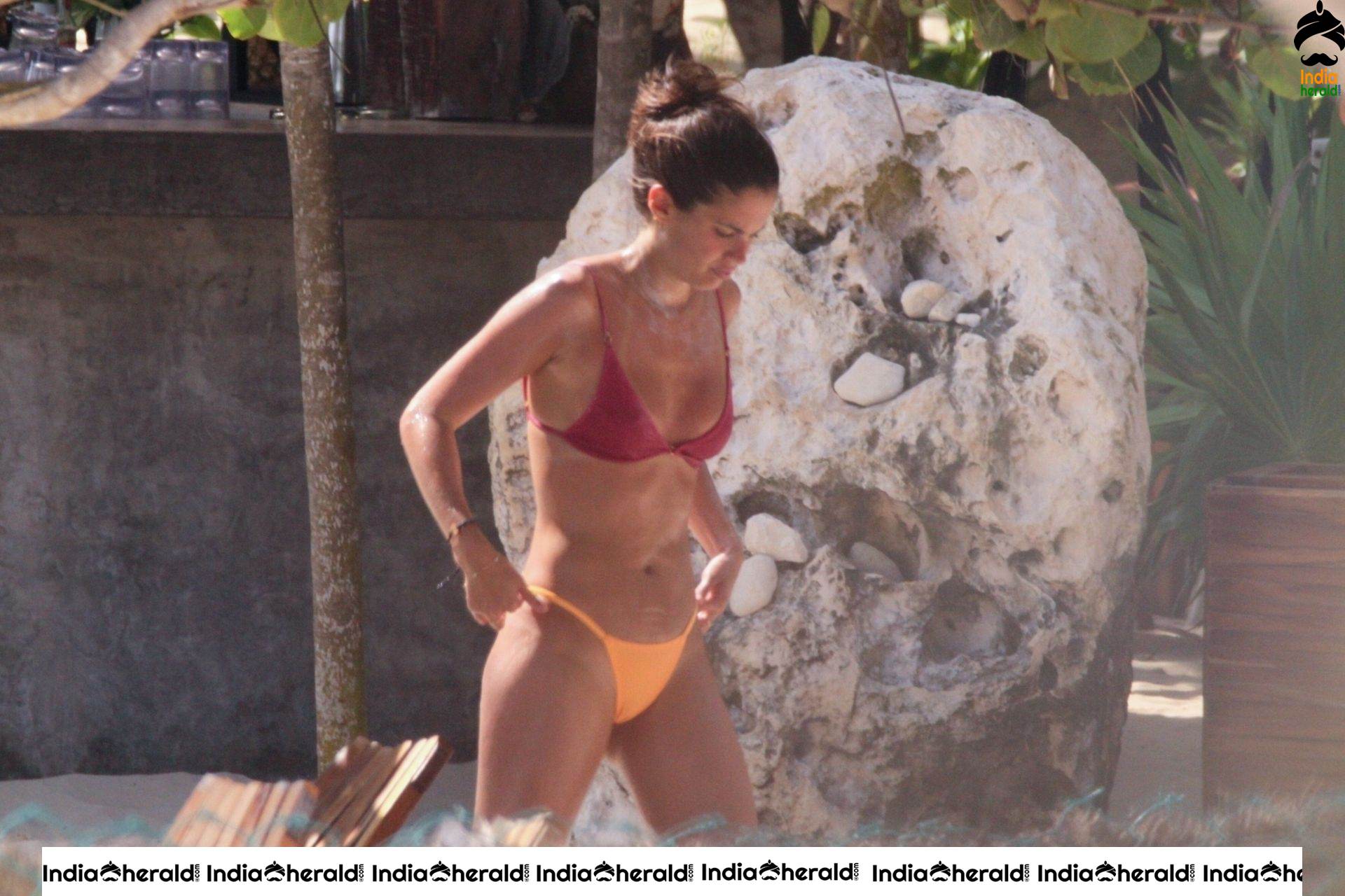 Sara Sampaio afternoon tanning session in Bikini at the pool in Tulum