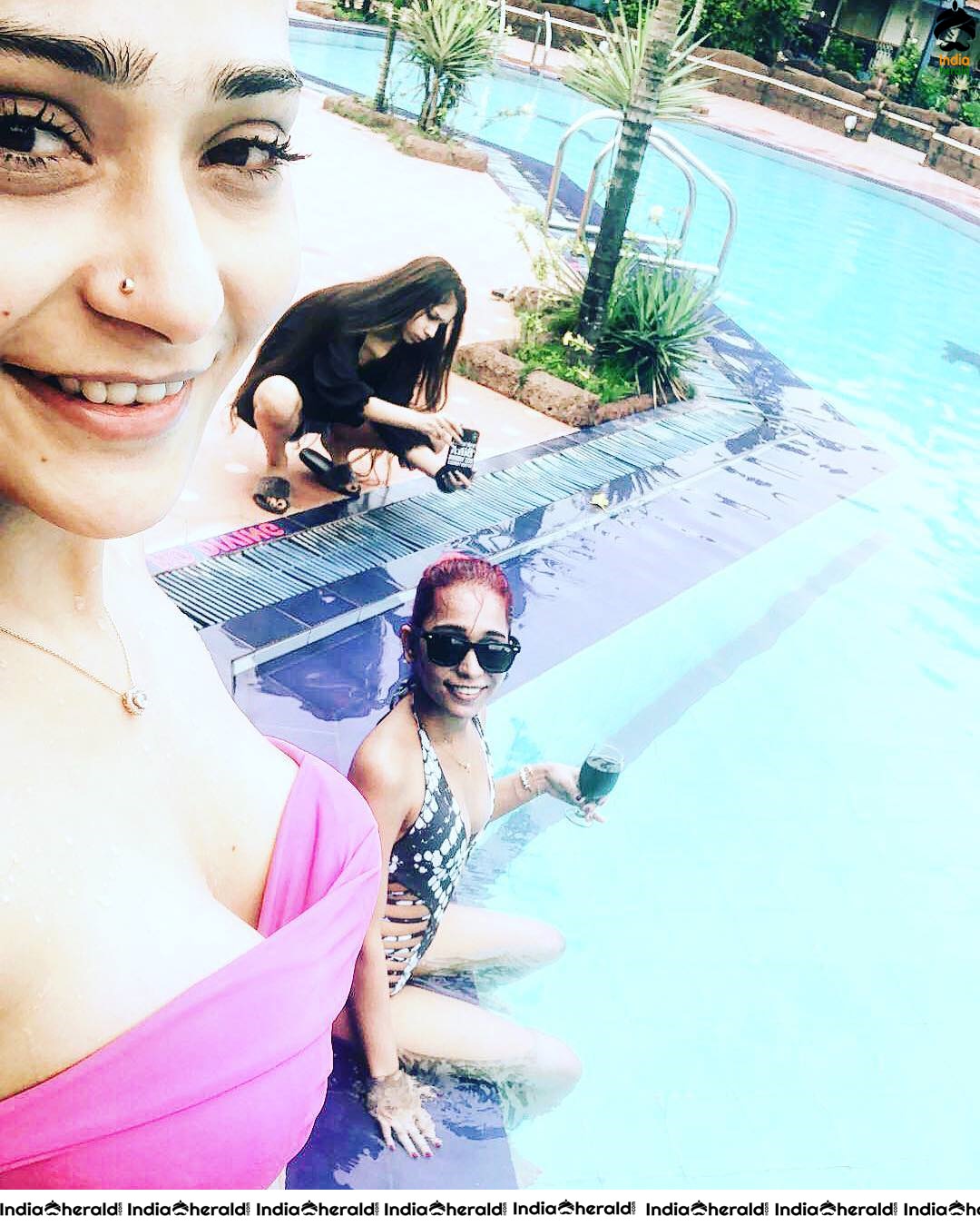 Sarah Khan Oozing Hotness in Bikini as she gets wet by Pool Side