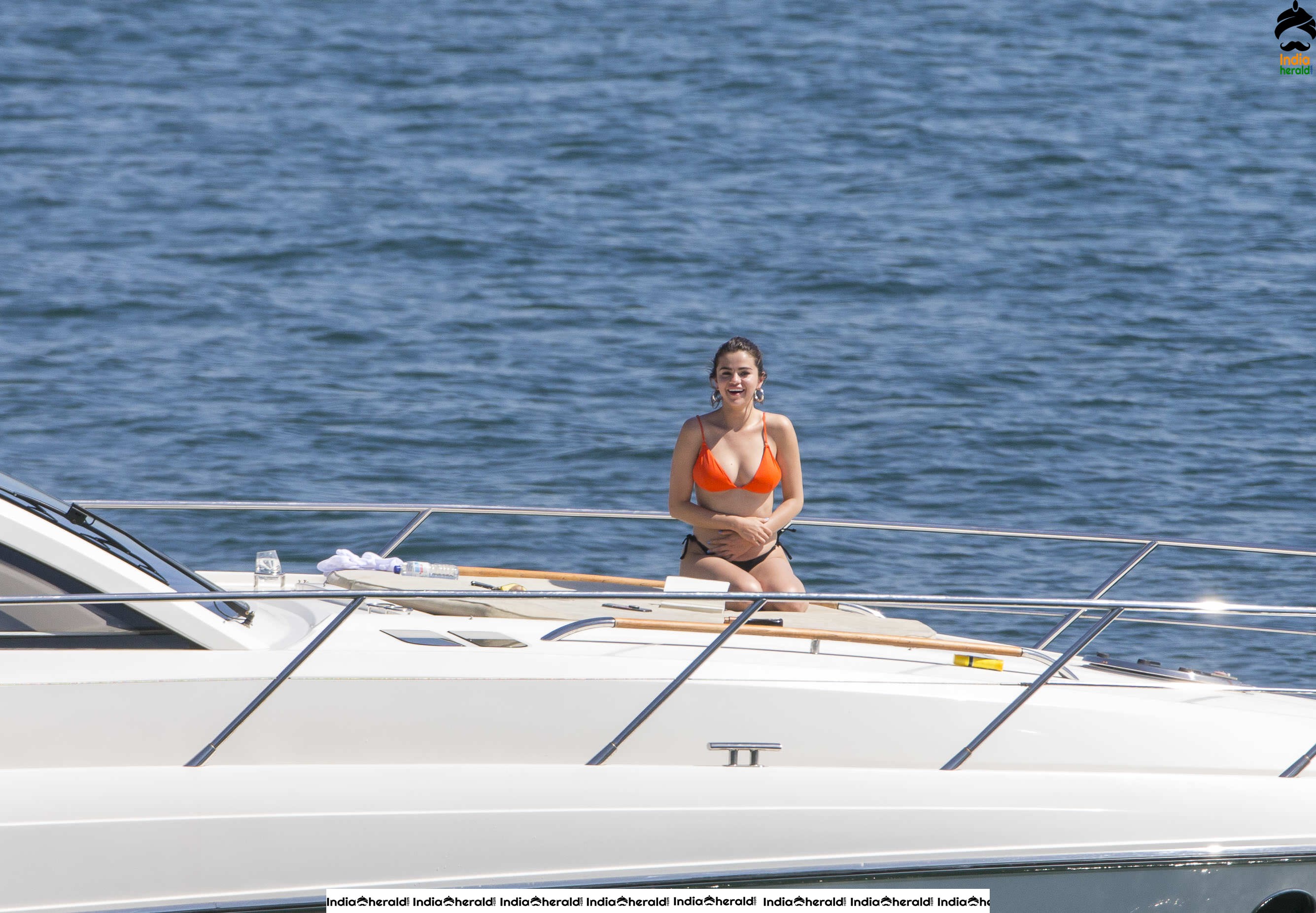 Selena Gomez in Orange Bra and Black Panty on a Yacht in Sydney Set 1