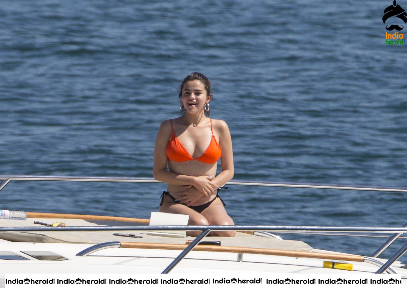 Selena Gomez in Orange Bra and Black Panty on a Yacht in Sydney Set 1