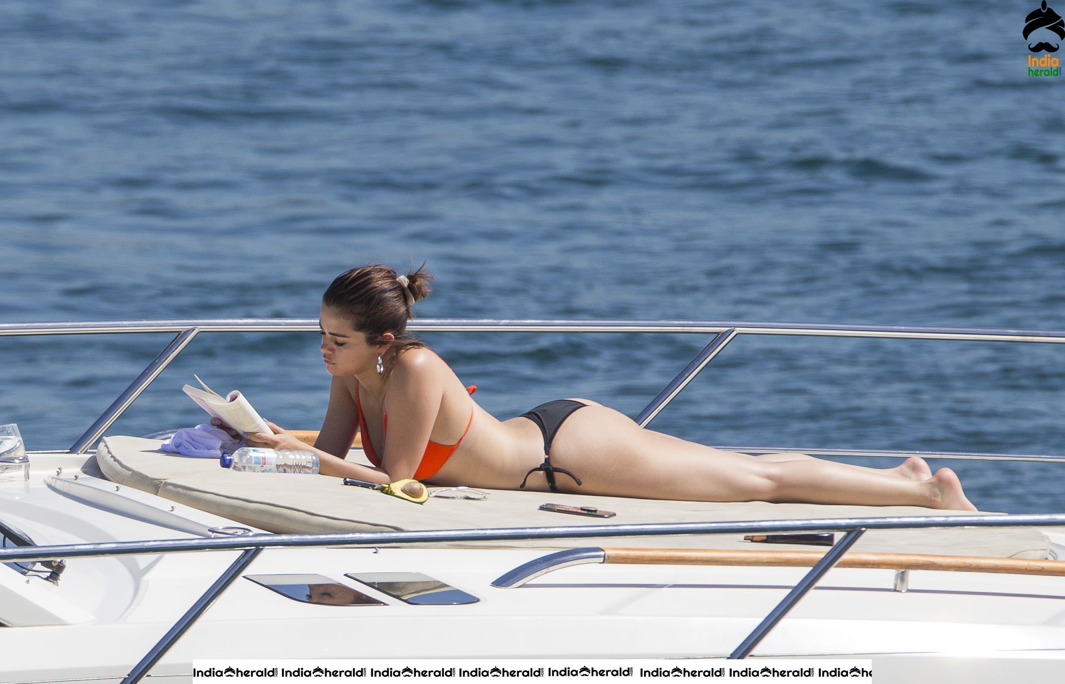Selena Gomez in Orange Bra and Black Panty on a Yacht in Sydney Set 1