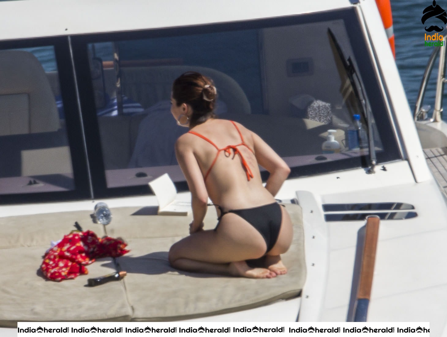 Selena Gomez in Orange Bra and Black Panty on a Yacht in Sydney Set 2