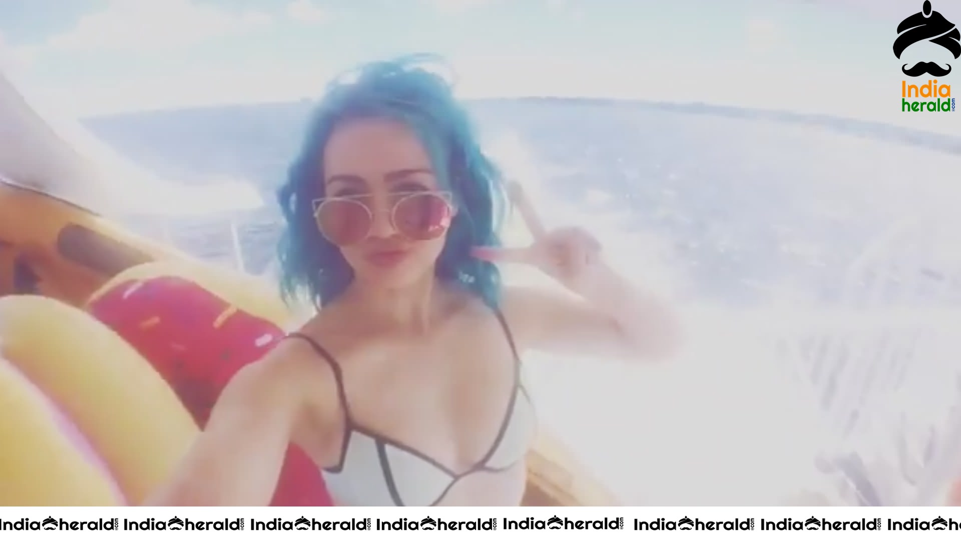 Skye Sweetnam in Blue And Black Bikini Top On A Boat