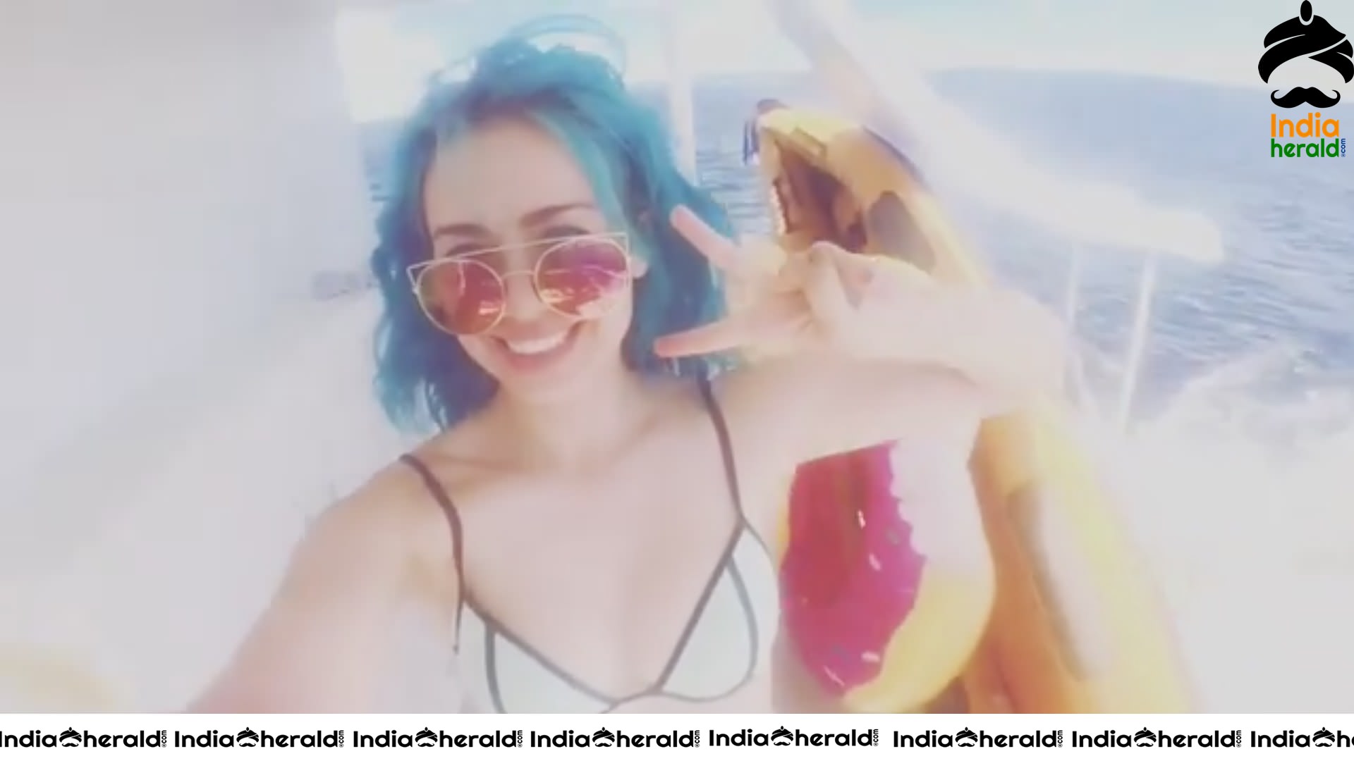 Skye Sweetnam in Blue And Black Bikini Top On A Boat