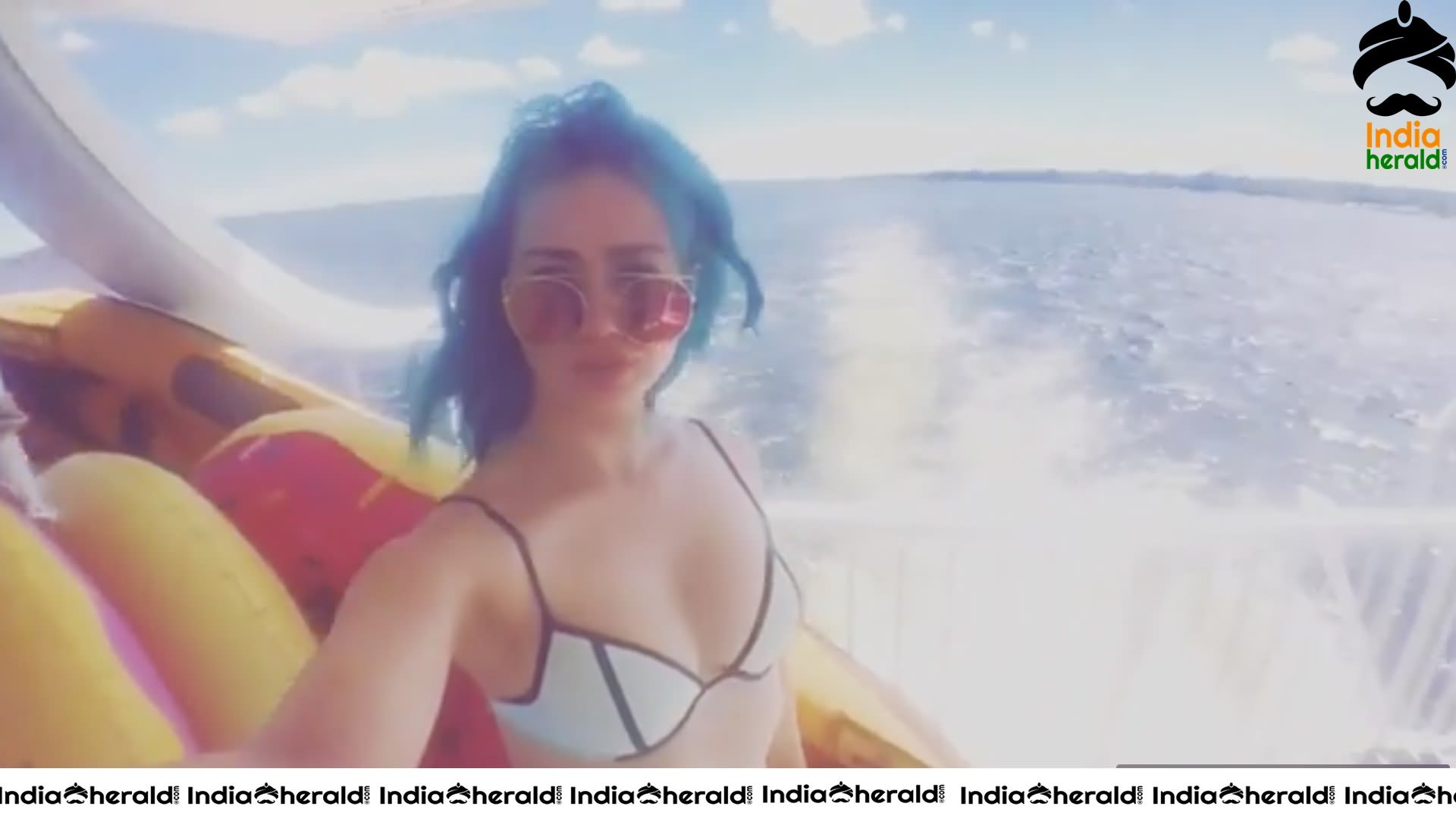 Skye Sweetnam in Blue And Black Bikini Top On A Boat