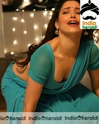 Tamannaah Removing Her Saree And Exposing Her Milky White Boby Hot Photos