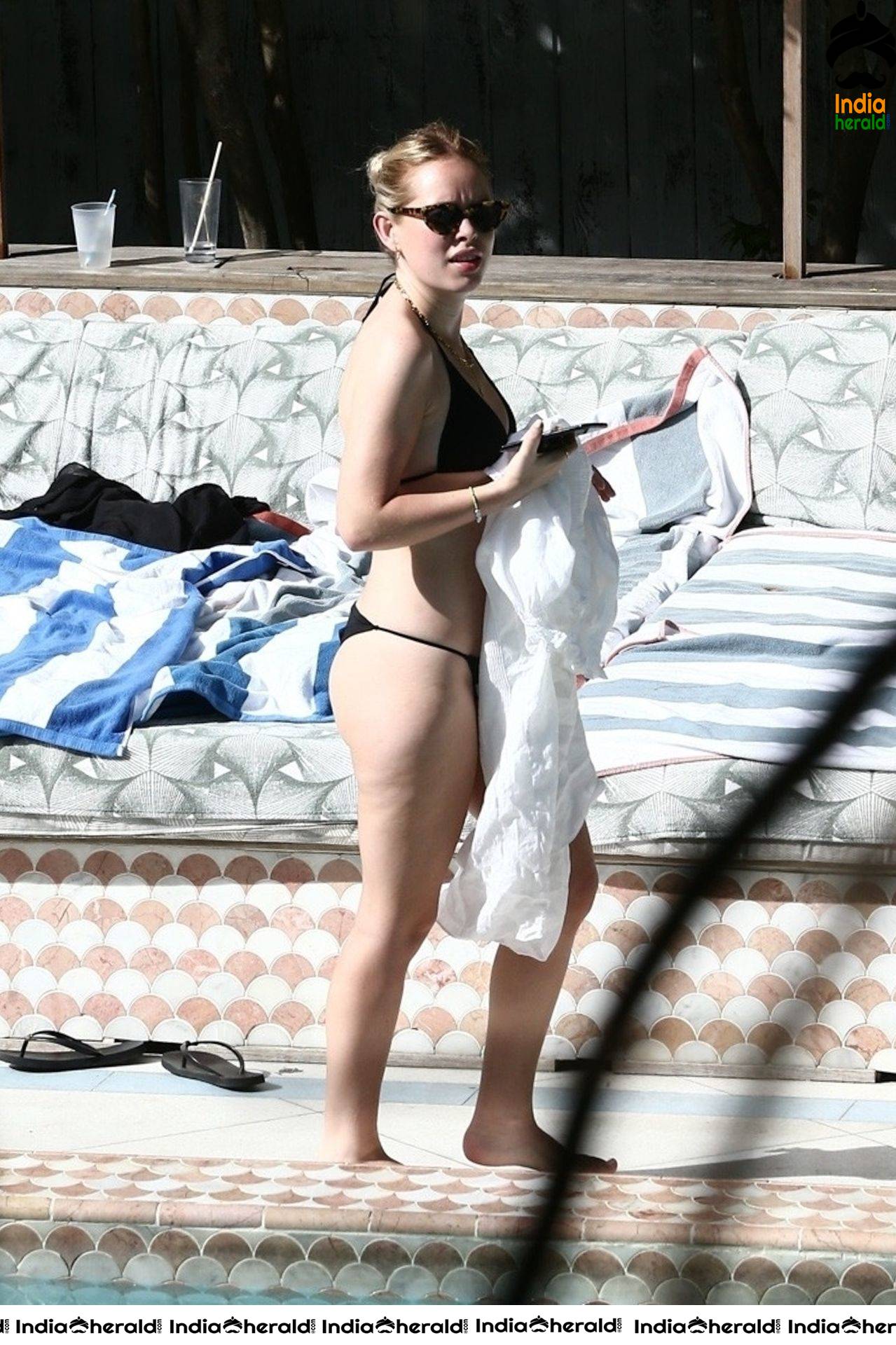 Tanya Burr caught by Paparazzi in a black bikini at Miami