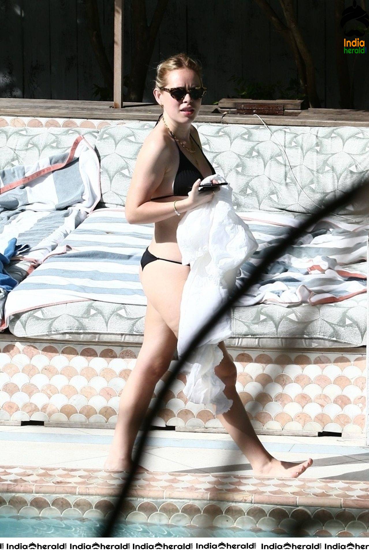 Tanya Burr caught by Paparazzi in a black bikini at Miami