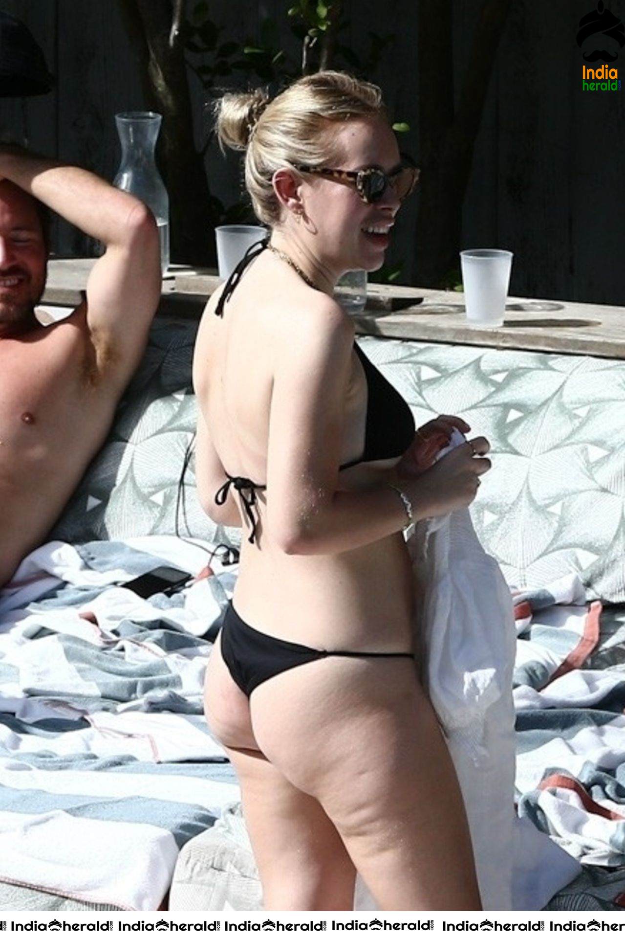 Tanya Burr caught by Paparazzi in a black bikini at Miami