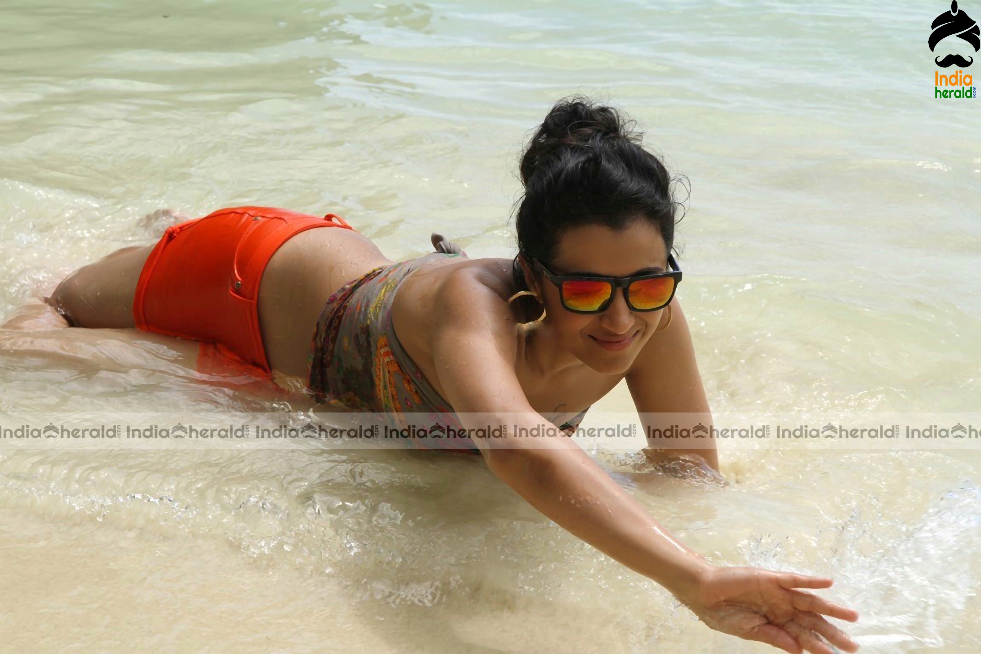 Trisha Krishnan Unseen Hot HD Bikini Photos in Beach where she gets wet and erects our Mood Set 1