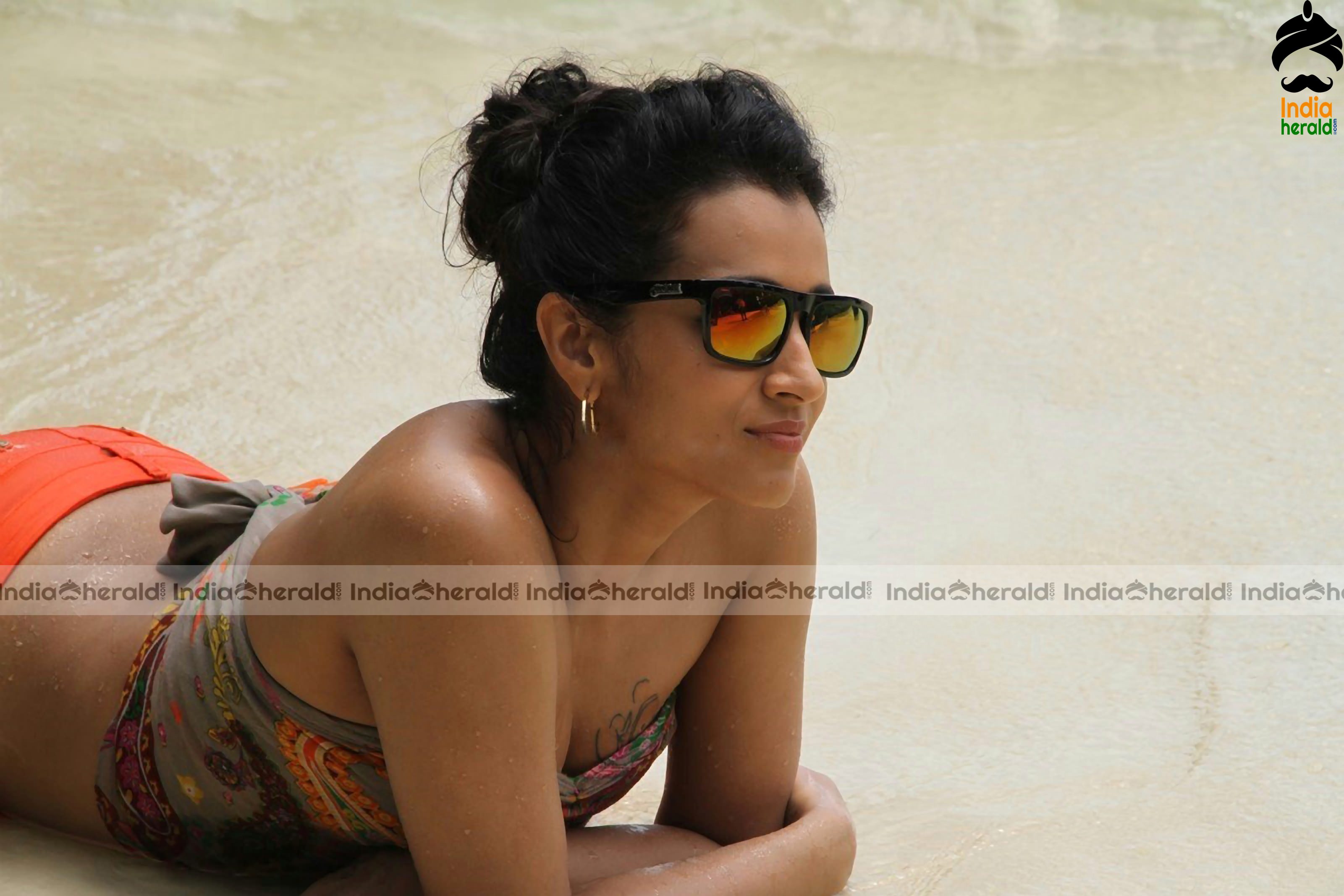 Trisha Krishnan Unseen Hot HD Bikini Photos in Beach where she gets wet and erects our Mood Set 1