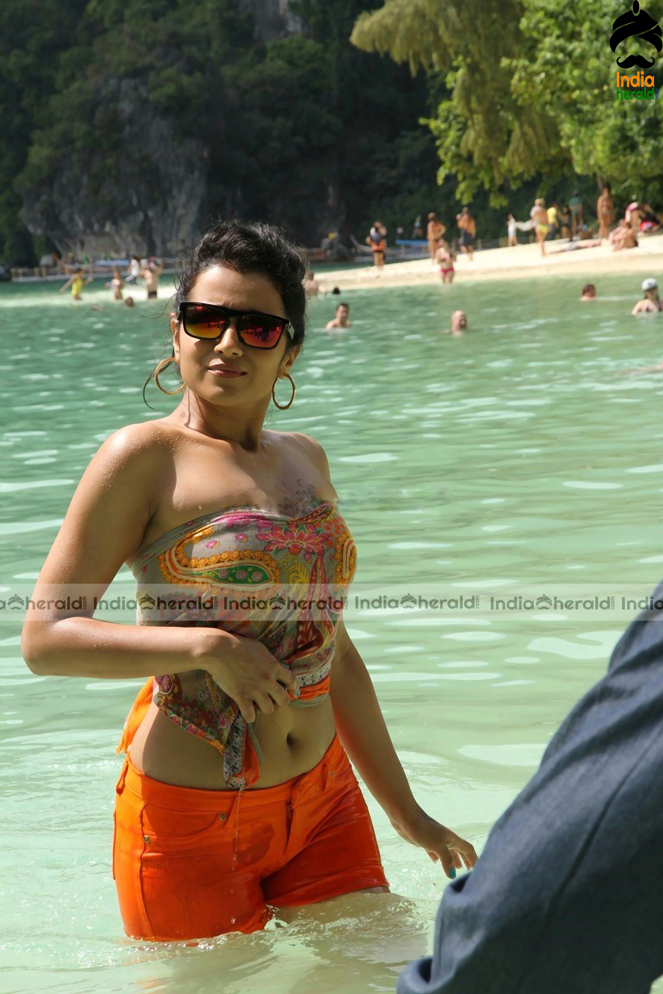 Trisha Krishnan Unseen Hot HD Bikini Photos in Beach where she gets wet and erects our Mood Set 3