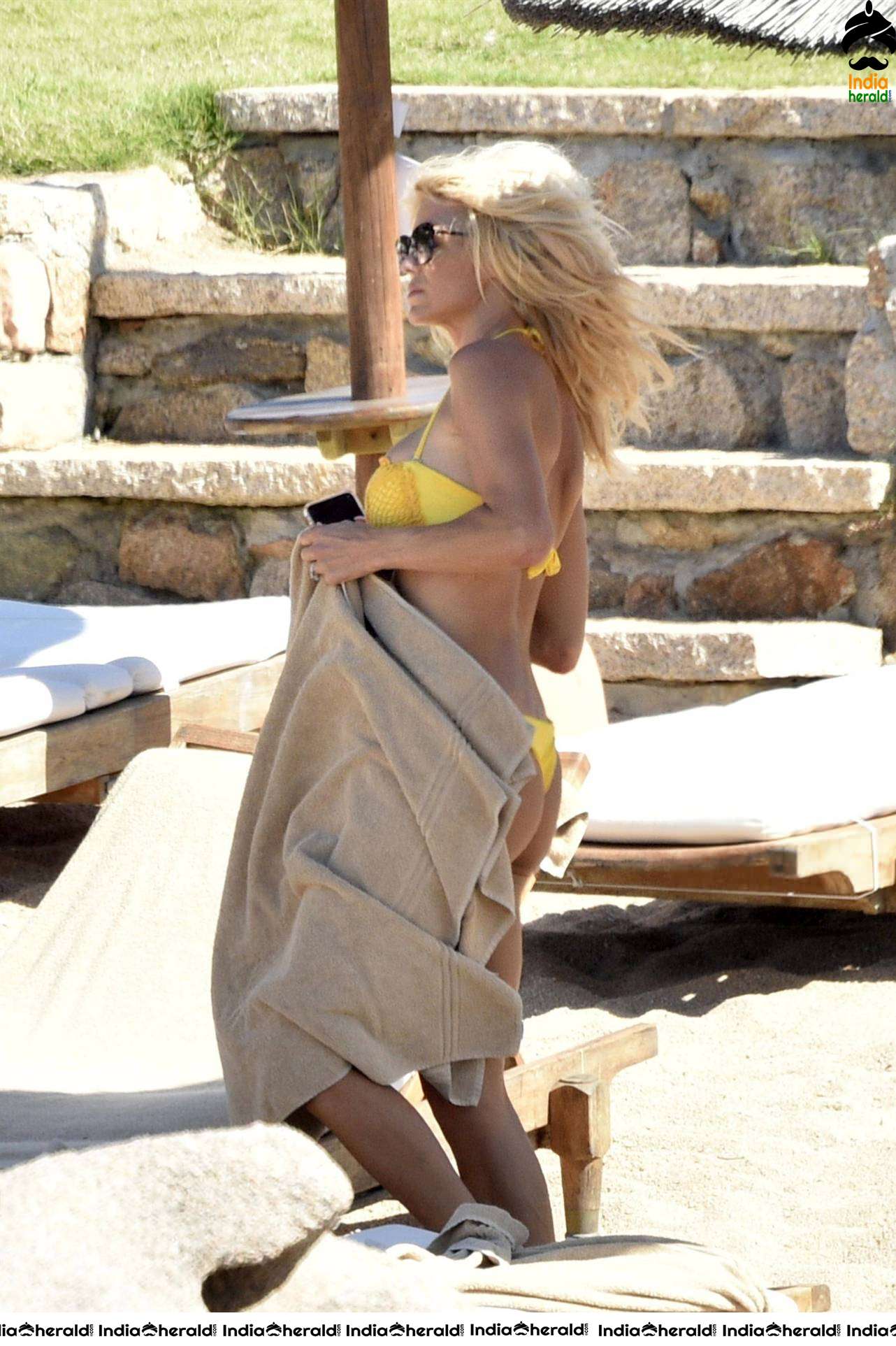 Victoria Silvstedt caught in Bikini on the beach in Porto Cervo