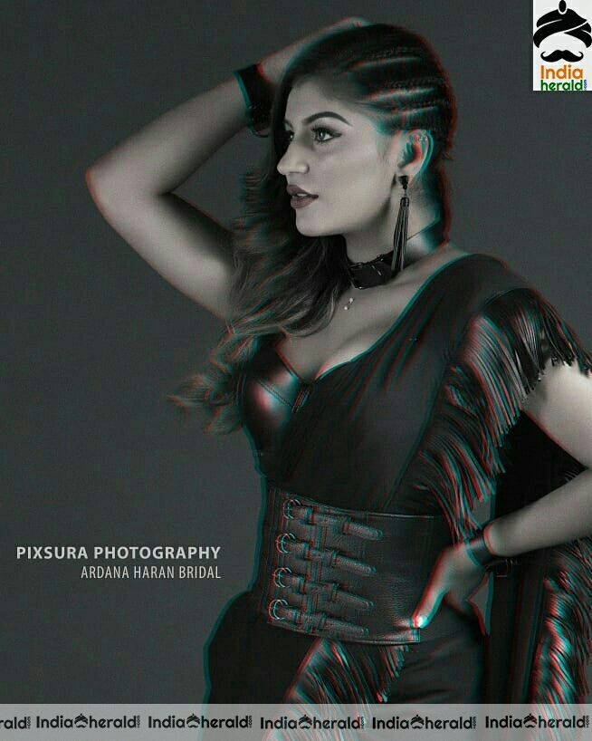 Yashika Aannand Hot Black Sizzling Photoshoot