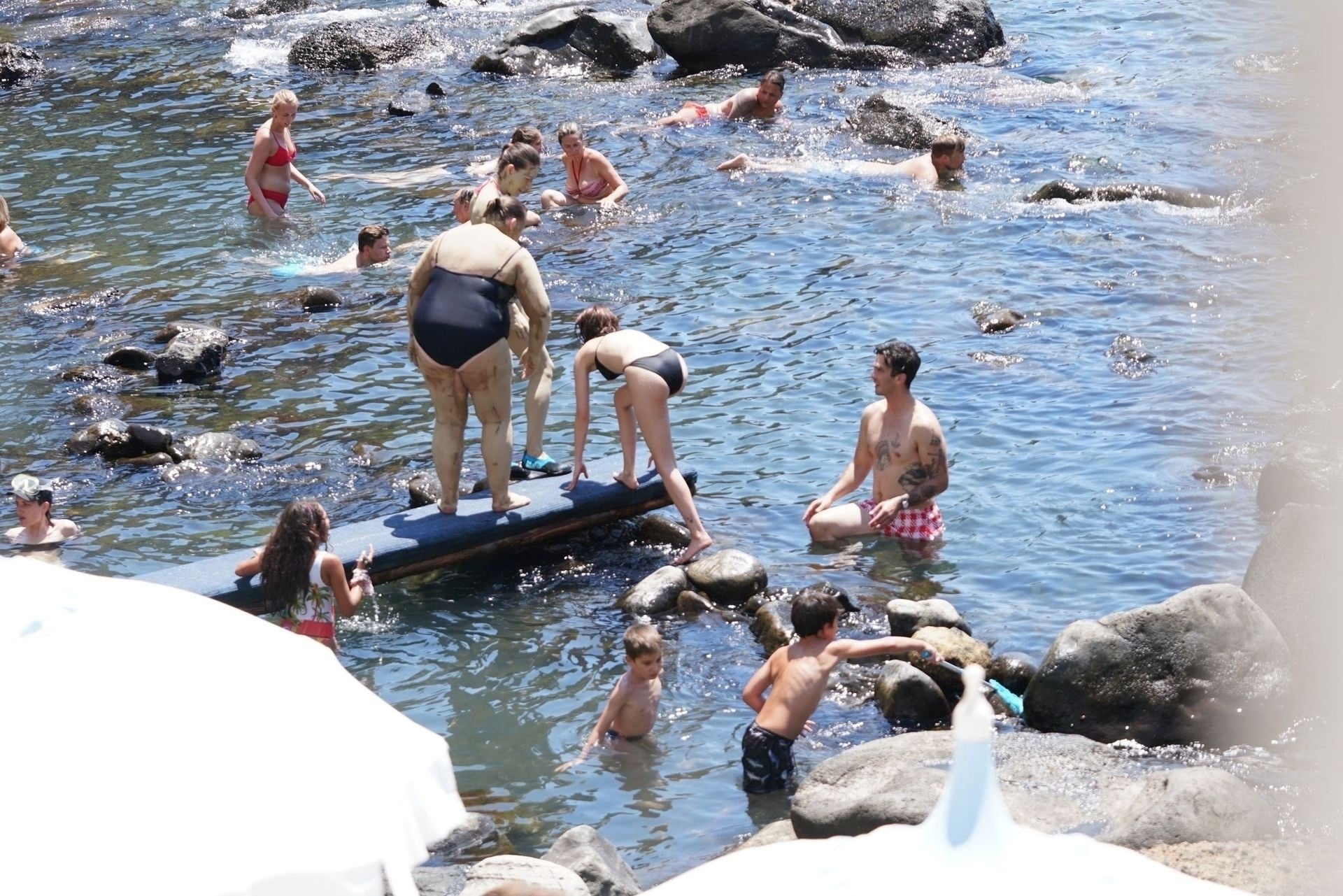 Zoey Deutch In A Black Bikini At Italy Set 1