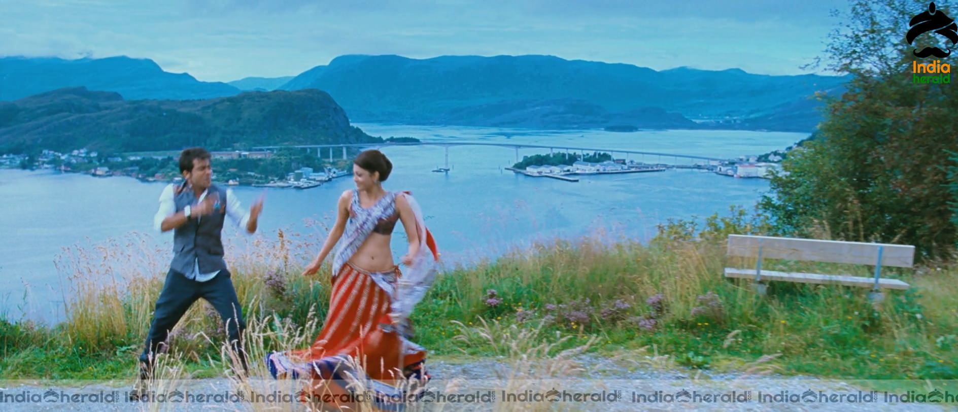 Kajal Aggarwal Showing Her Hot Midriff and Cleavage in a Sexy Exposing Lehenga Sequence Set 1