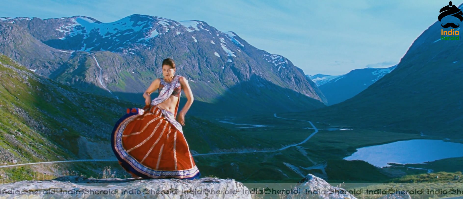 Kajal Aggarwal Showing Her Hot Midriff and Cleavage in a Sexy Exposing Lehenga Sequence Set 2