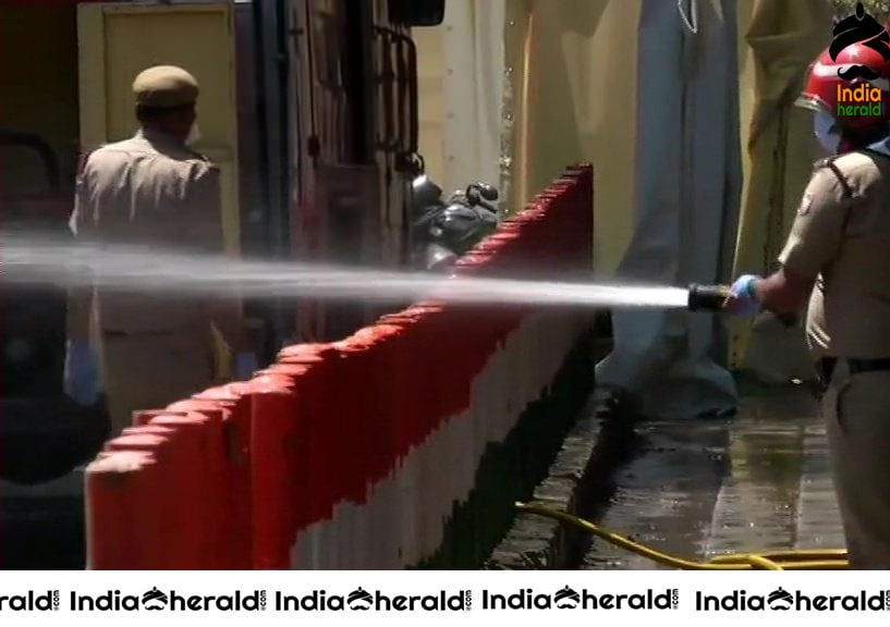 Police personnel sanitize Nizamuddin Markaz area which emerged as a Corona Virus hotspot