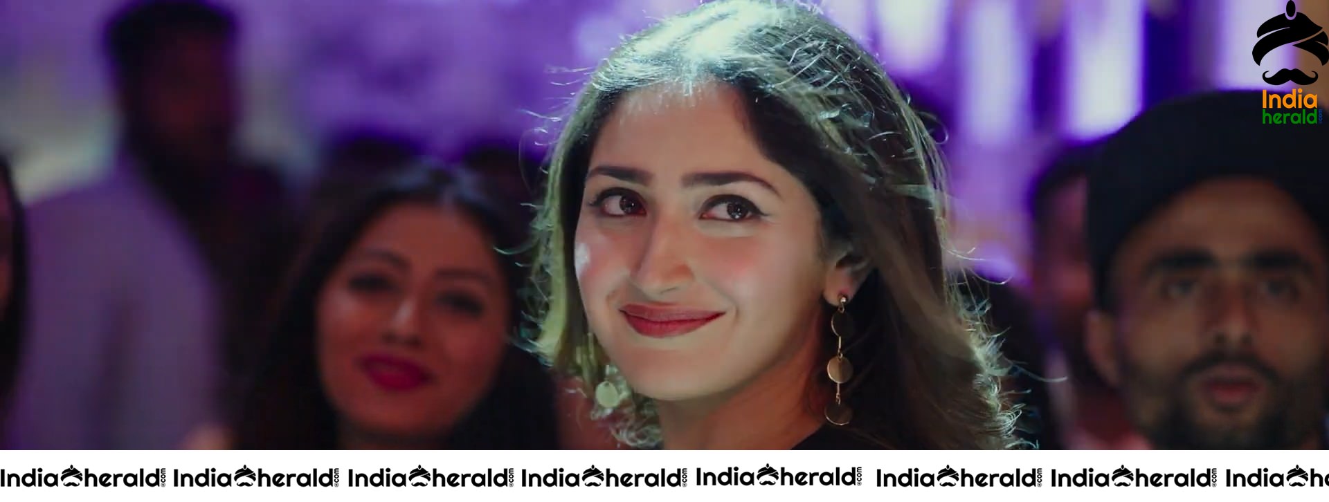 Sayyesha And Suriya In Hey Amigo Song Stills Set 1