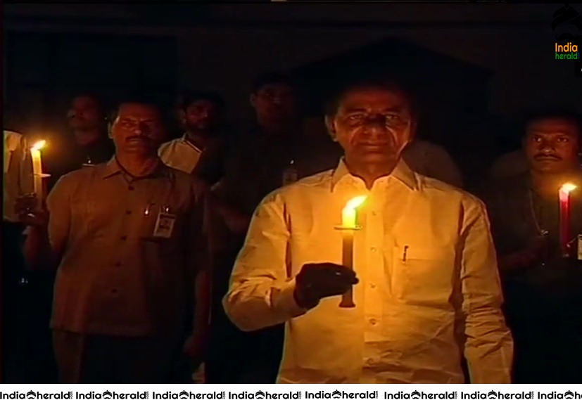 Telangana CM KCR light up a candle to mark India fighting against Corona Virus