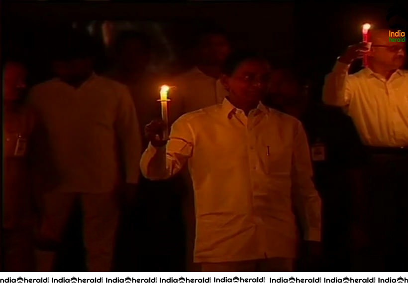 Telangana CM KCR light up a candle to mark India fighting against Corona Virus