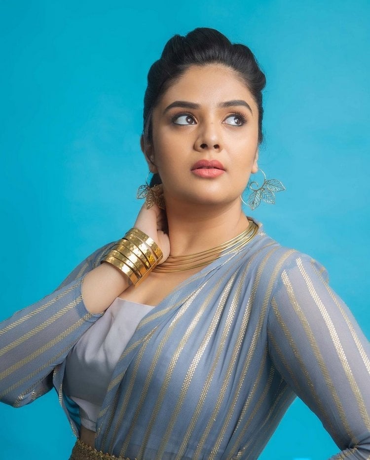 Sreemukhi Hot Photos In Stylish Dress