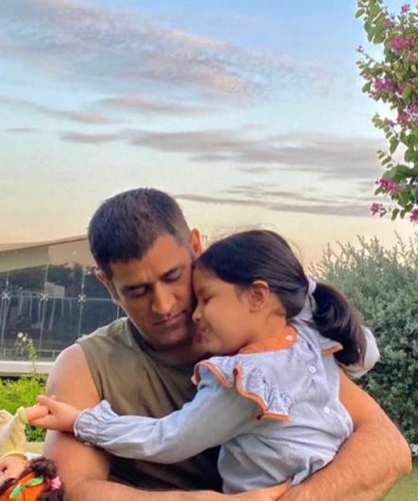 Mahendra Singh Dhoni cute photos with his daughter