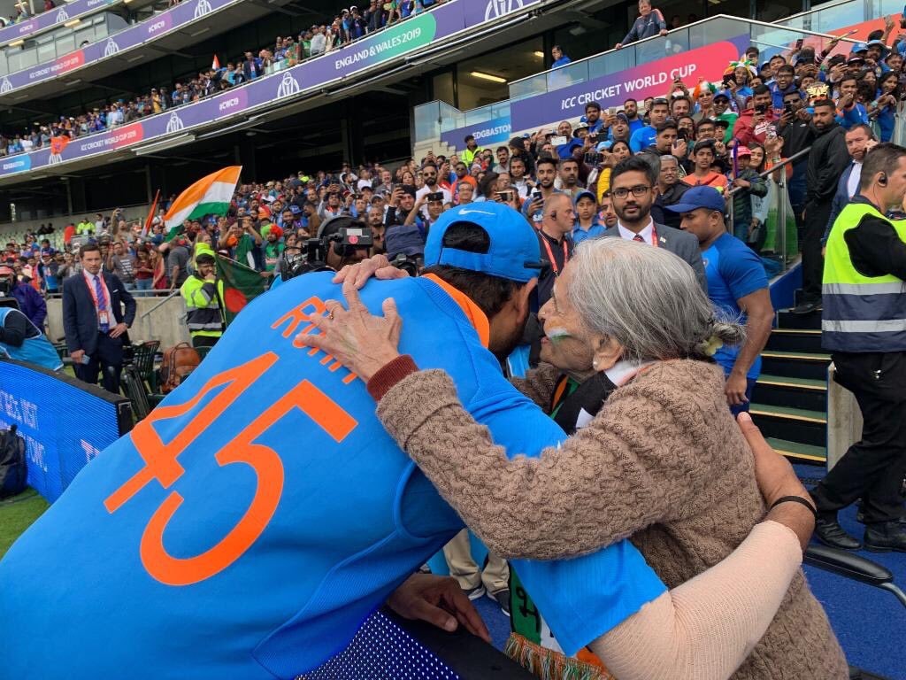 Indian Players With An 87 Year Old Fan After Winning The Match Against Bangladesh