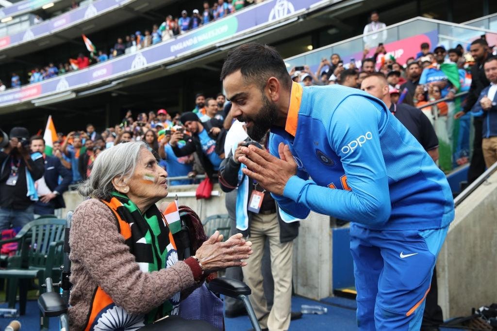 Indian Players With An 87 Year Old Fan After Winning The Match Against Bangladesh
