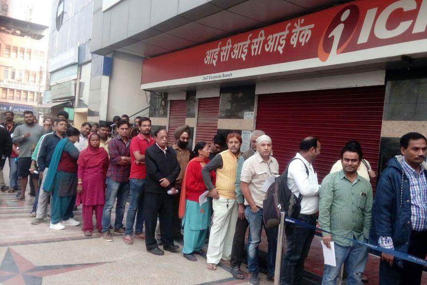 Long Queues at Banks to Exchange Old Notes Photos